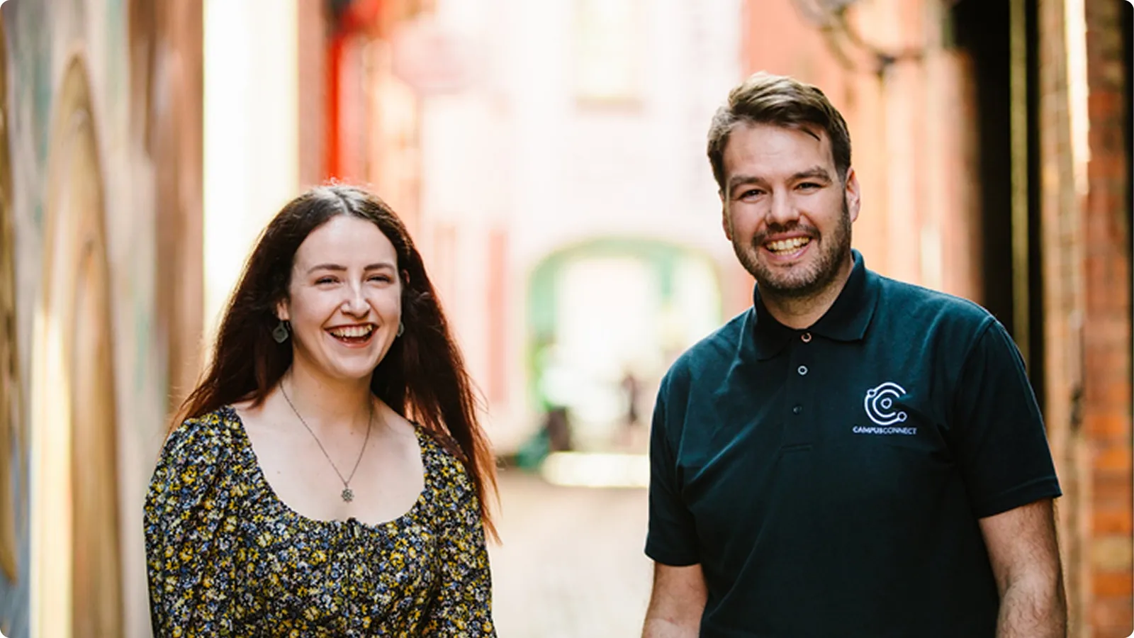 Two members of the CampusConnect team smiling